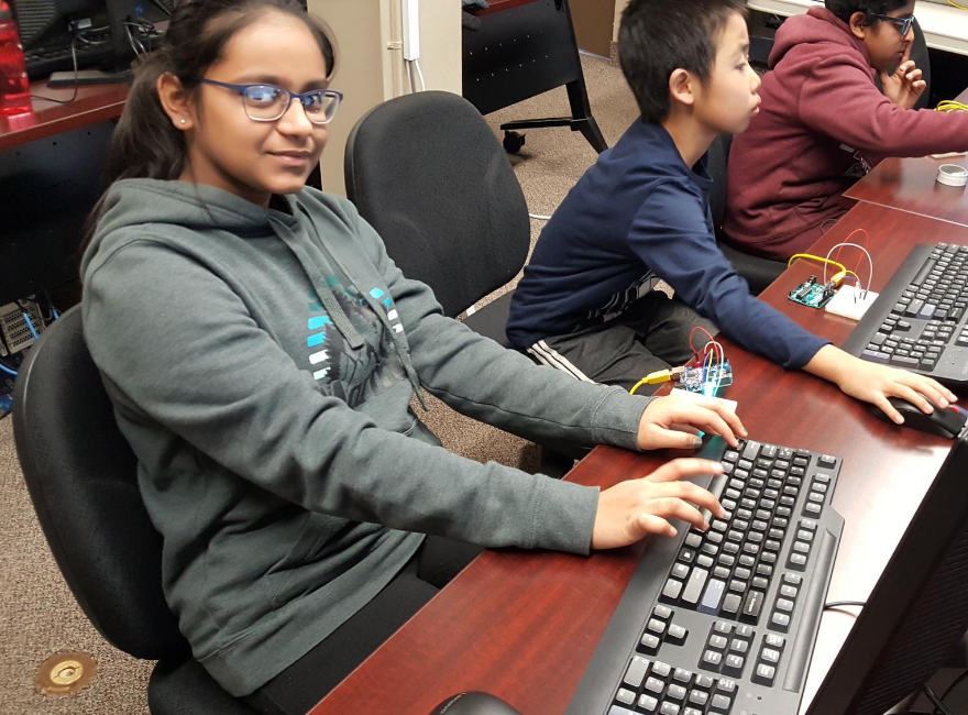 newcomer youth learn computer coding