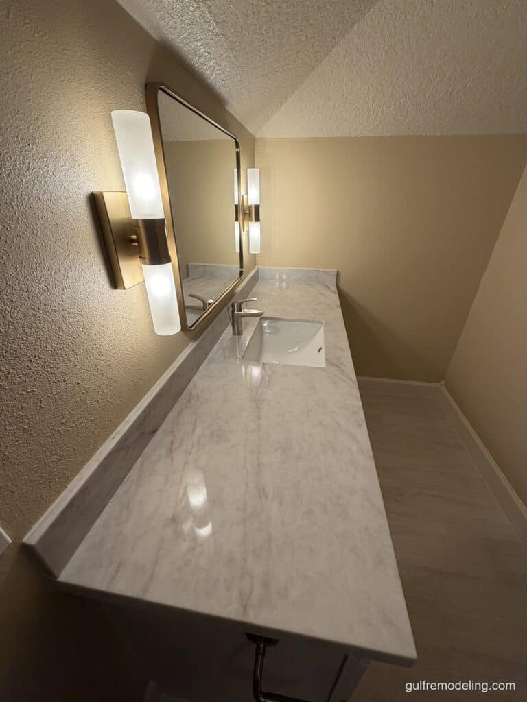 Vanity with marble-look countertop - bathroom remodel in Houston