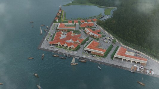 Charming coastal village with red-tiled roofs nestled on a scenic peninsula by the sea.