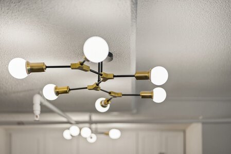 Stylish contemporary chandelier featuring globe lights, perfect for modern interior decor.
