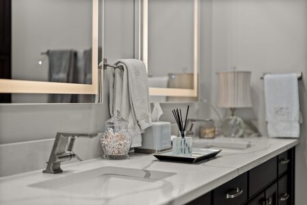 Beautiful bathroom vanity with sink, mirror, and stylish accessories for modern home decor.