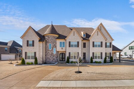 Elegant brick house with turret.