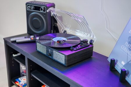 High-quality DJ turntable with modern audio equipment.