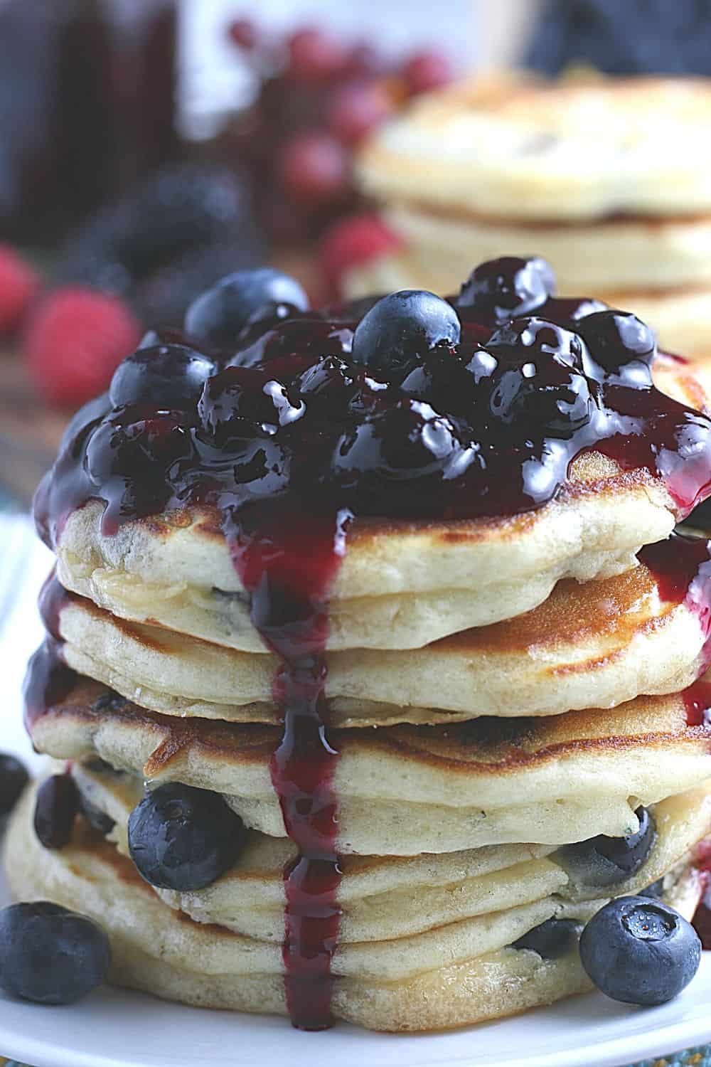 Start your morning off with a delicious batch of Blueberry Buttermilk Pancakes from scratch. This light and fluffy blueberry pancake recipe is perfect for blueberry season or all year round.