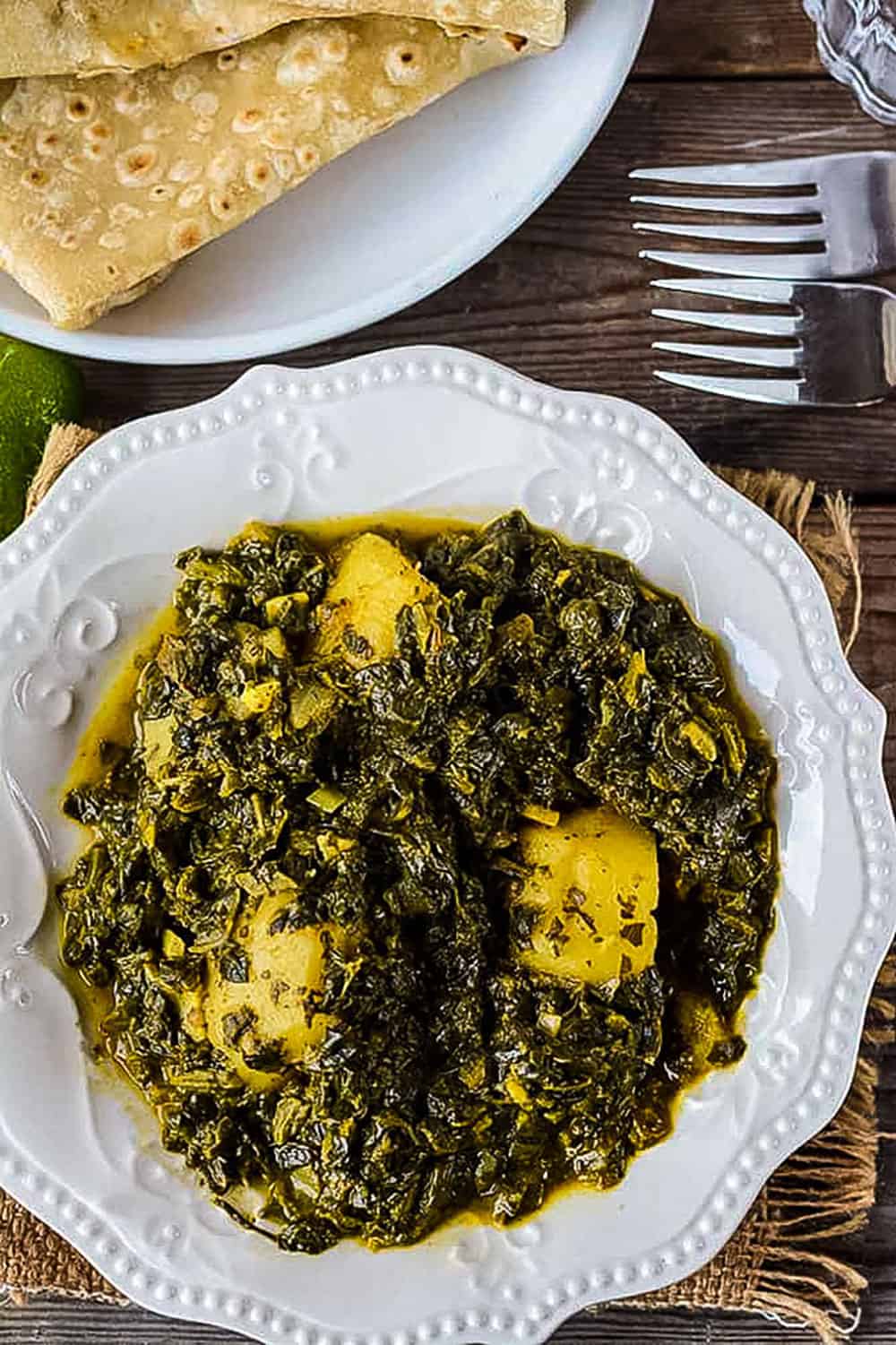 Aloo Palak Potato And Spinach Curry Healthier Steps Aloo palak, or spinach and potato curry, is one of the most popular vegetarian indian or pakistani recipes. aloo palak potato and spinach curry