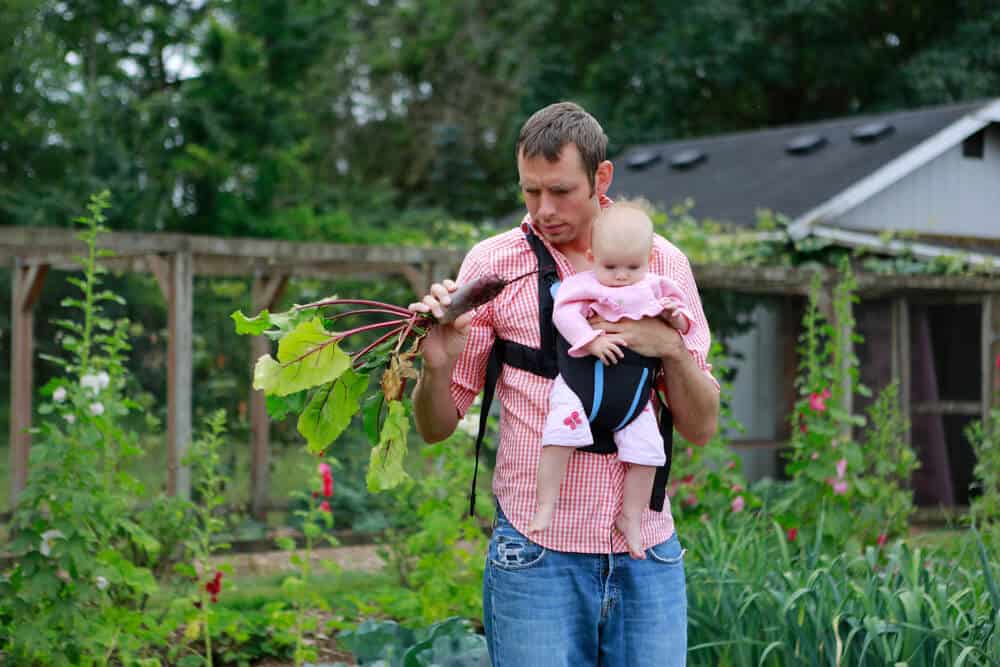 Five Things That Will Shape the Role of Dads - dad baby carrying