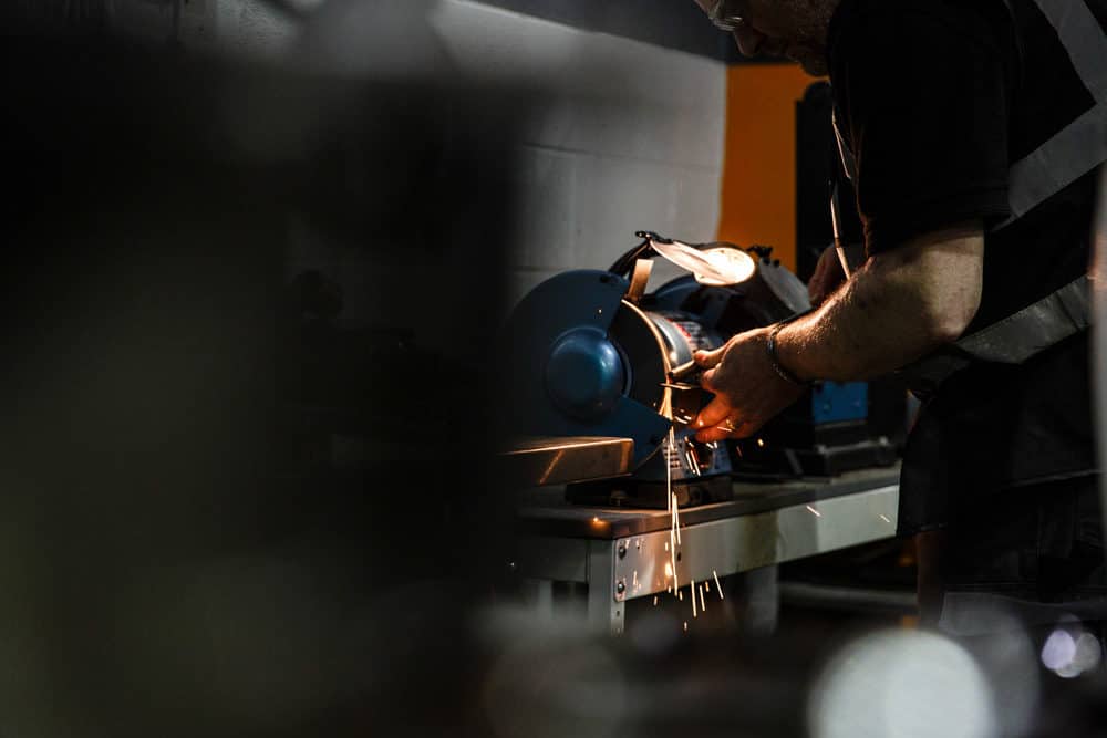 Manufacturing image of a man using a welding equipment