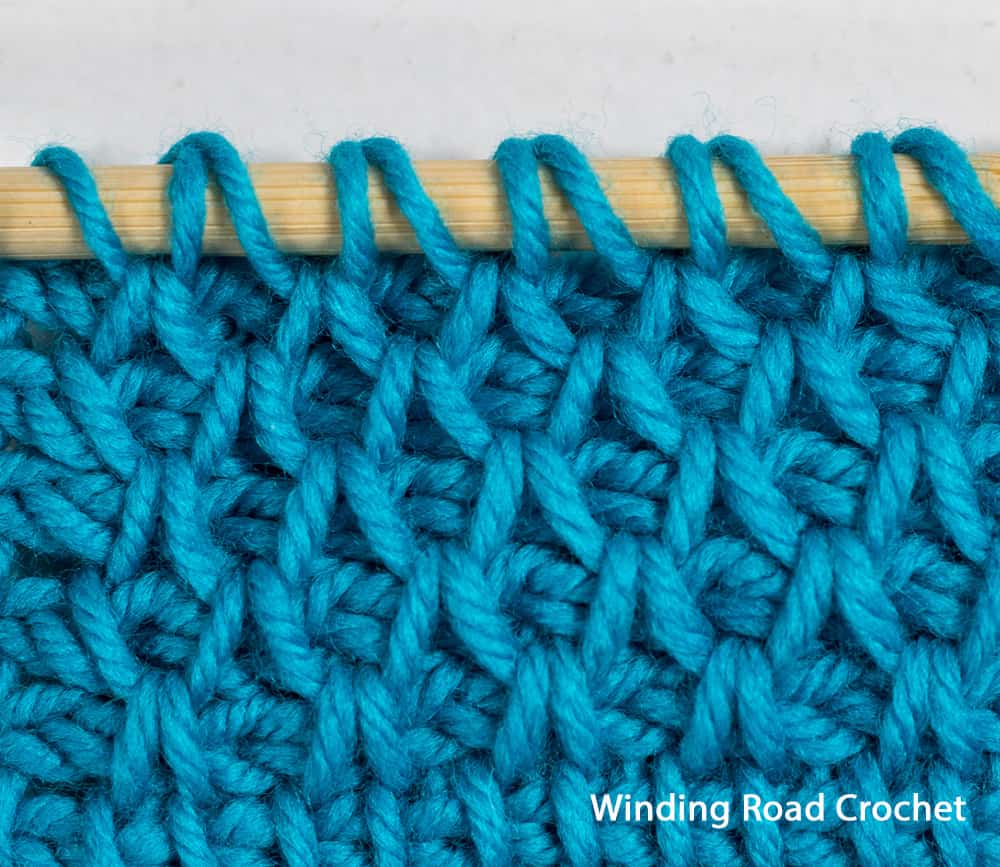 Learn all the basics of Tunisian crochet with this free online course. In lesson 7, we learn the diamond-patterned Tunisian Smock stitch.