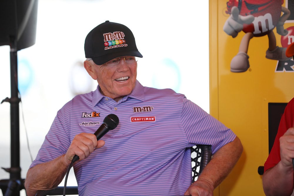Joe Gibbs of Joe Gibbs Racing talking in the M&M's Glampground tent