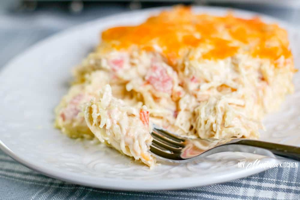 chicken spaghetti squash on white plate with fork