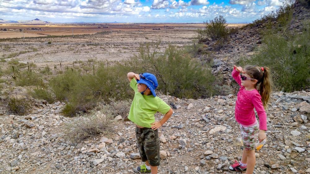 boy and girl hiking in the desert rv living near casa grande arizona