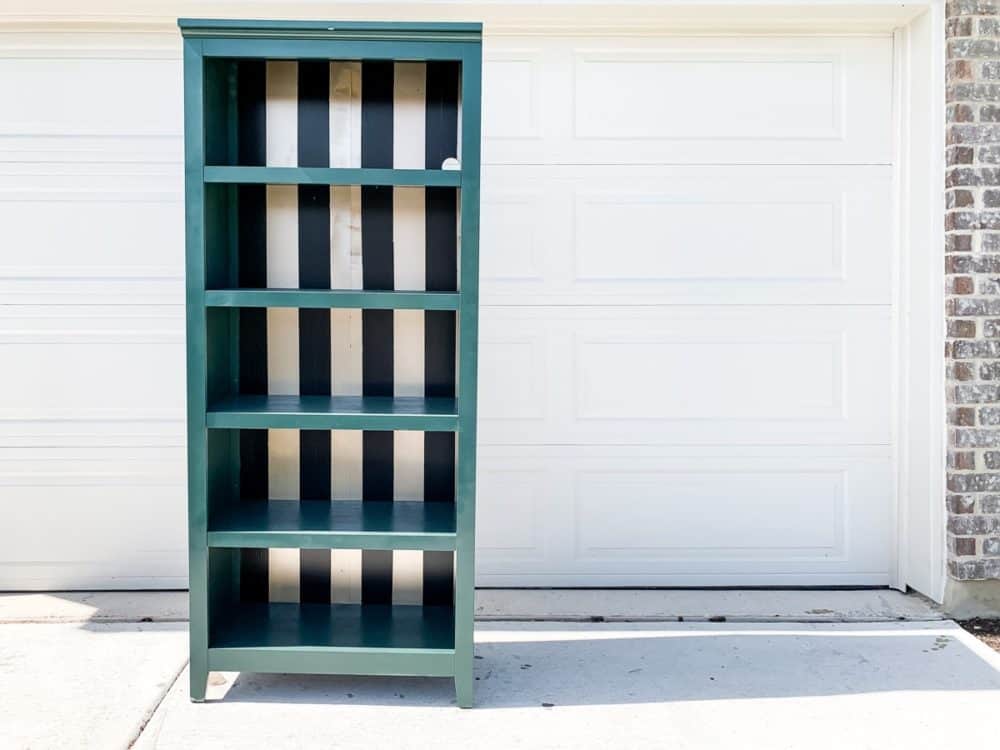 A green and gold bookcase