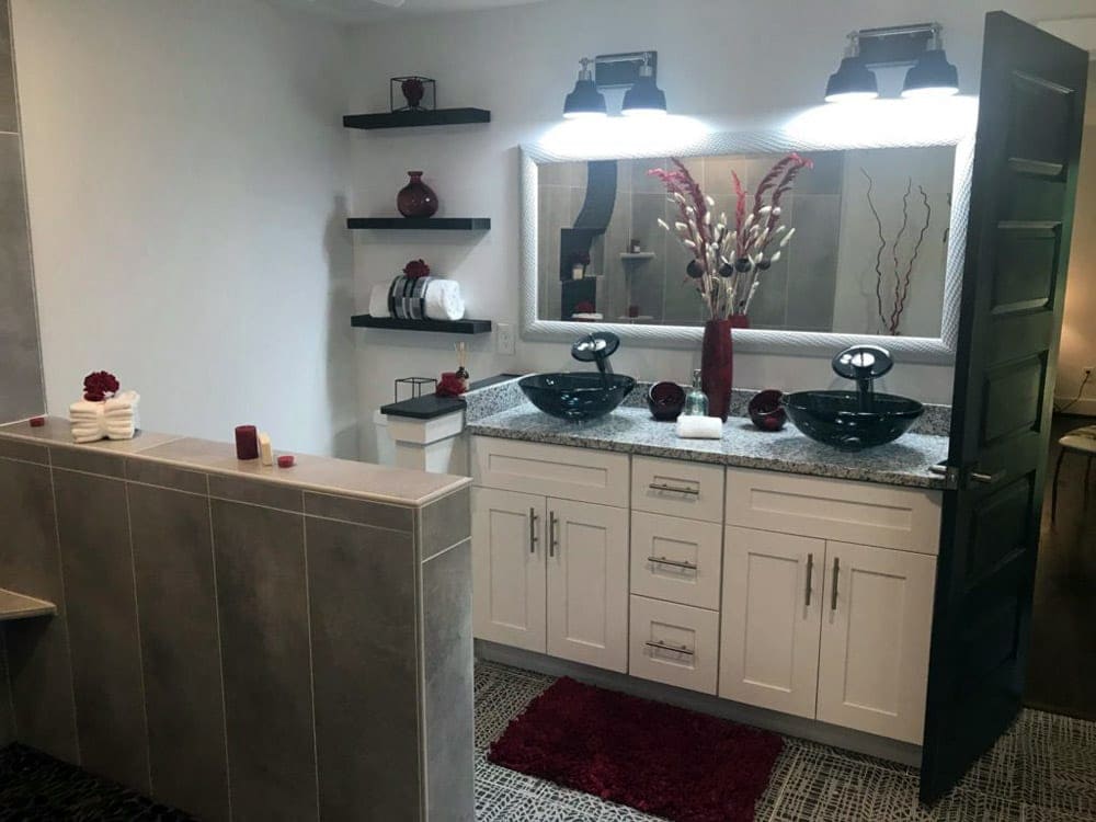 Bathroom remodel White cabinets with granite looking countertops