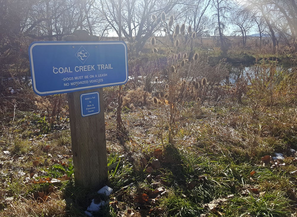 Coal Creek Trail sign along the river