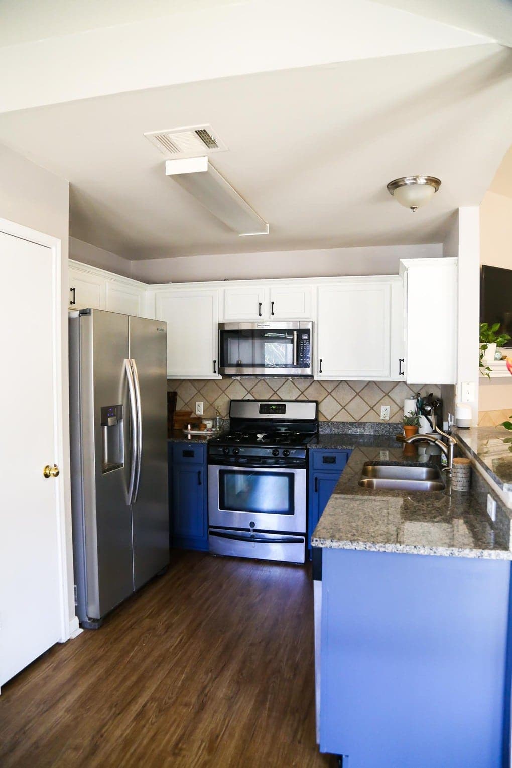 Our Diy Blue White Kitchen Cabinets Love Renovations