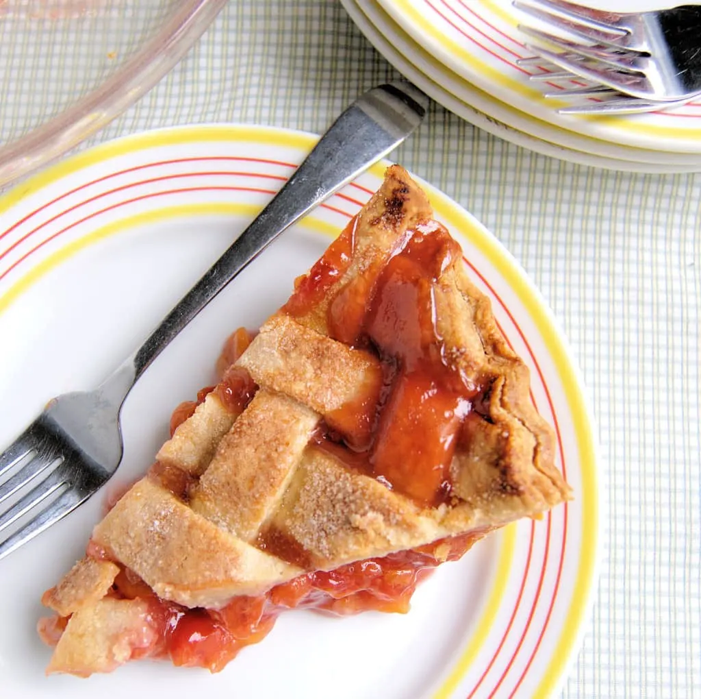 a slice of Sour Cherry Pie on a plate