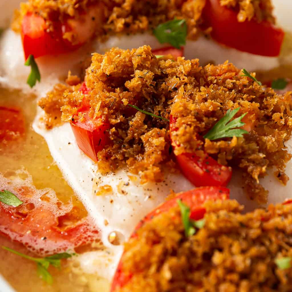 White Wine Baked Cod With Tomatoes And Crispy Breadcrumbs Basil And Bubbly Tip the chorizo mix into the middle of the paper. white wine baked cod with tomatoes and