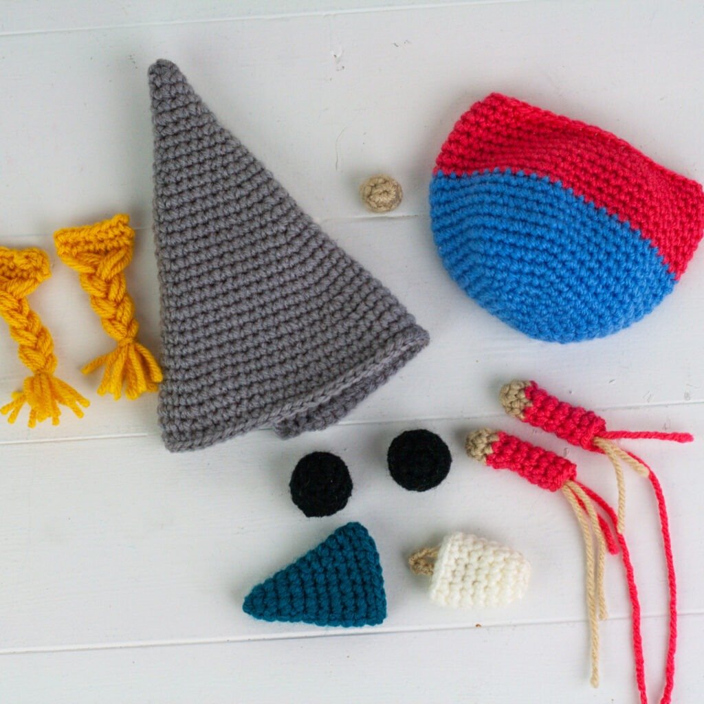 Crochet a daycare gnome or mommy and a baby gnome with this free crochet pattern. This gnome makes a great gift or just add them to your collection.