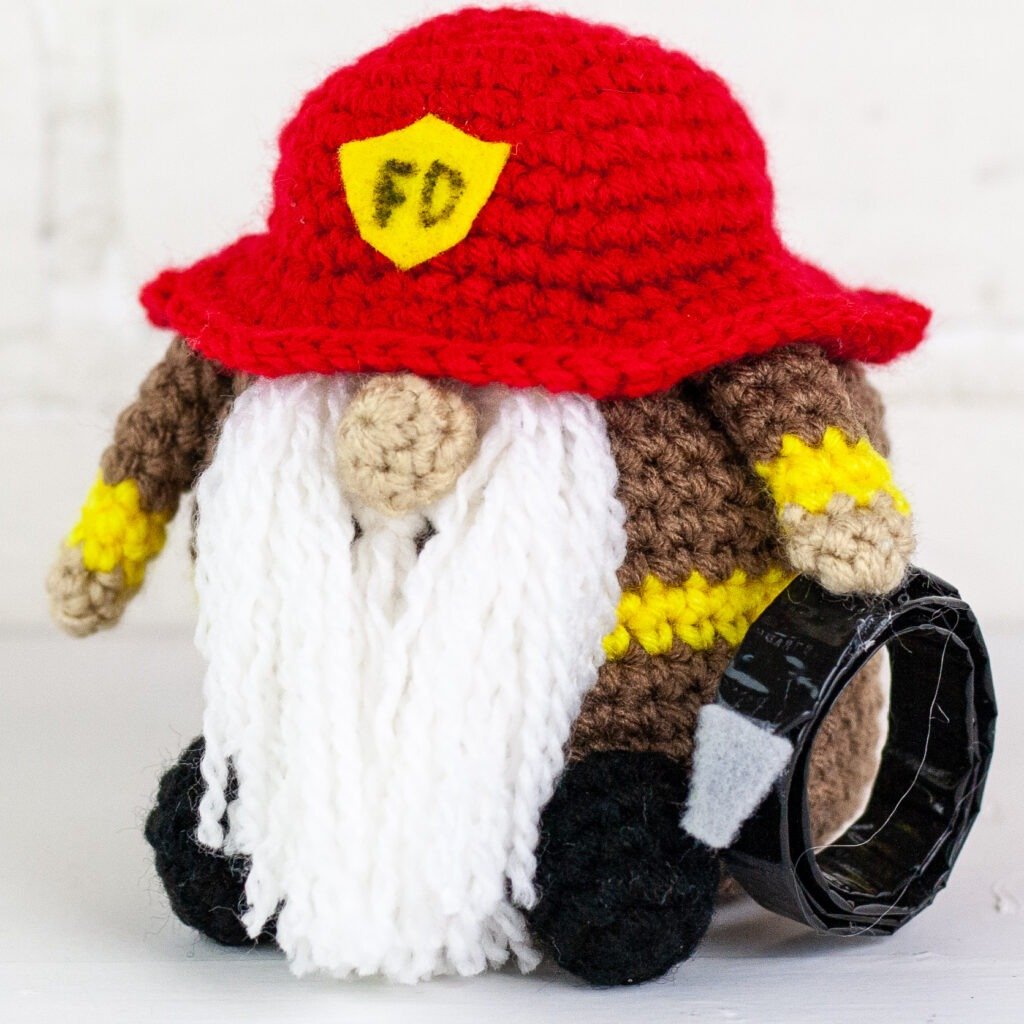 Crochet a firefighter gnome with this free crochet pattern. This is one of many of my profession gnomes series. This gnome makes a perfect gift.