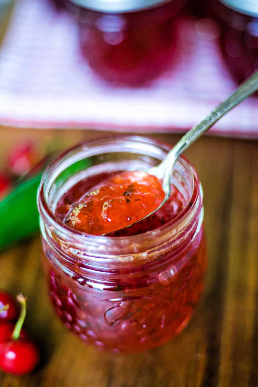 a spoon of hot cherry pepper jelly