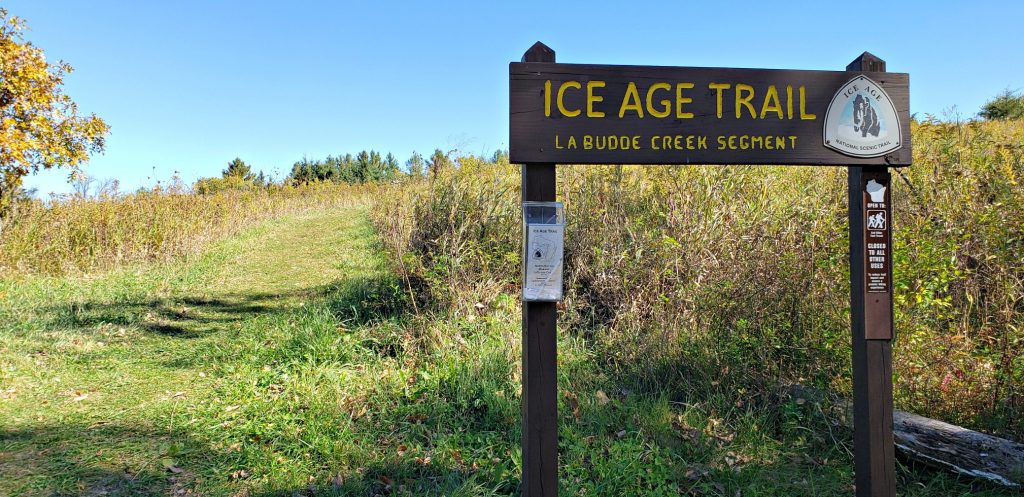 sign reading in part: Ice Age Trail La Budde Creek Segment on the Wisconsin Way pilgrimage