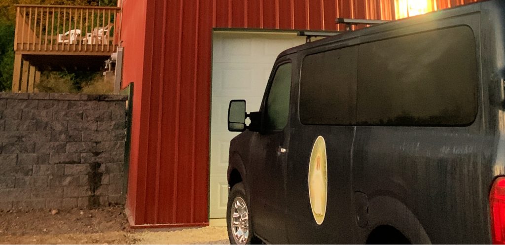 black van with picture of Mary, mother of Jesus on the door