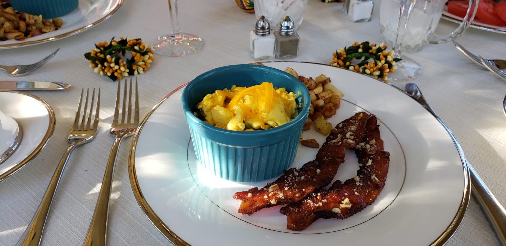 Bacon, eggs and potatos on grand china at Asheville B&B near Biltmore