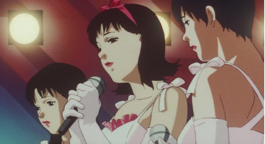 Mima, grupo J-pop Cham, cantan Plastic Love en la escena de inicio de Perfect Blue.