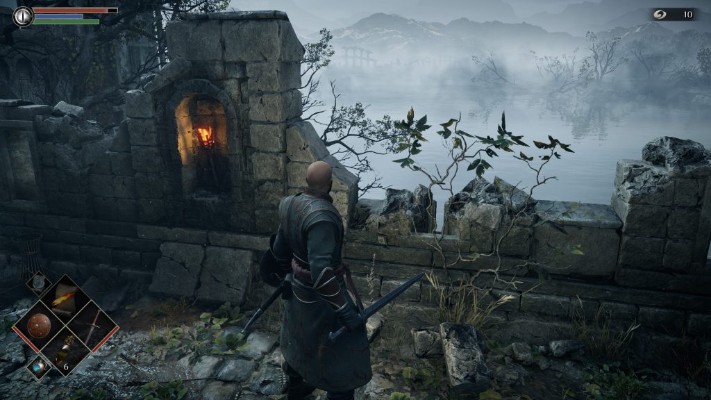 Un aventurero contempla un pantano en la review Demons Souls Remake