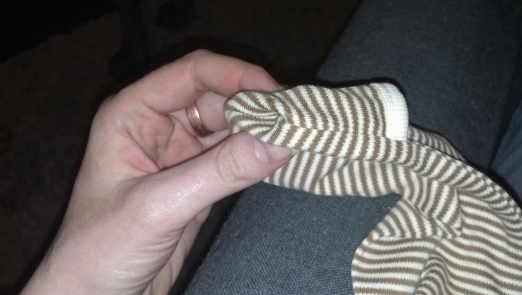 covered kid paws! Now, whenever I make little baby clothes I am doing this! :)