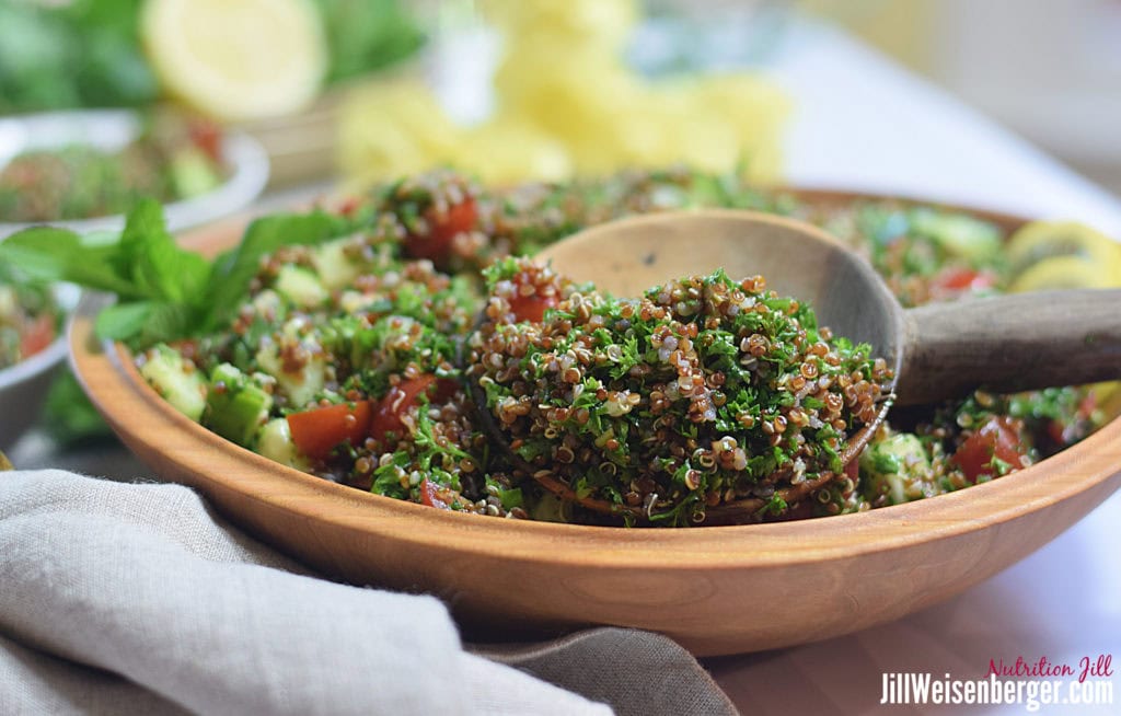 quinoa tabouli salad in a wooden bowl