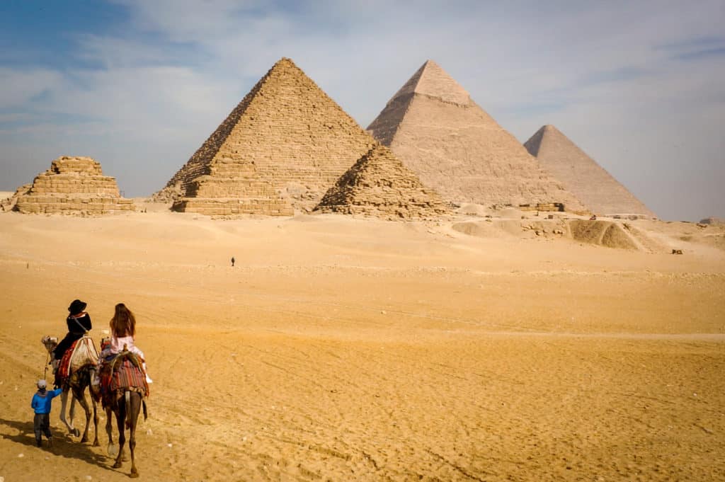 Pyramids of Giza on camel back
