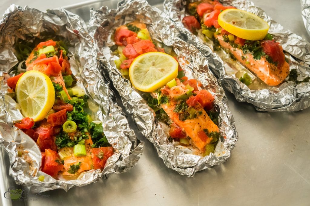 Salmon cooked in the instant pot with tomatoes, and fresh herbs.