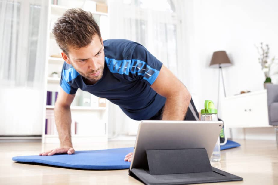 A guy has online training at home