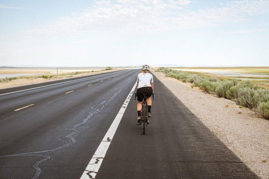 A person cycling on the road