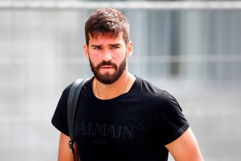 Brazil's goalkeeper Alisson leaves his team's hotel in Kazan on July 7, 2018, a day after the five-time champions crashed out of the Russia 2018 World Cup football tournament after a 2-1 quarter-final defeat to Belgium. (Photo by Benjamin CREMEL / AFP) (Photo credit should read BENJAMIN CREMEL/AFP/Getty Images)