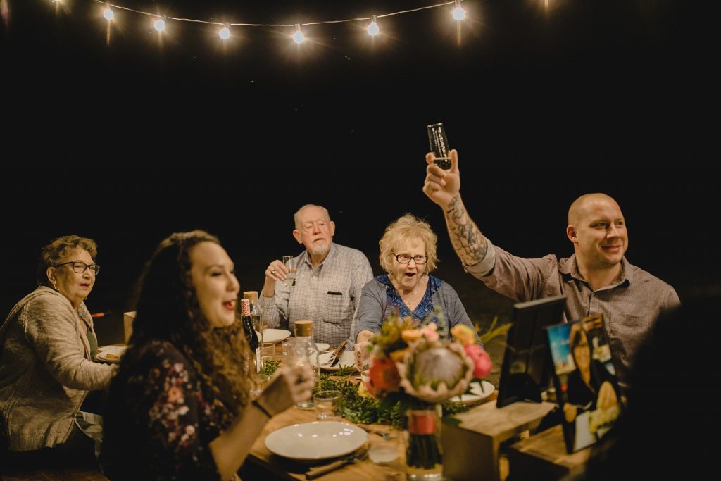 small wedding reception under string lights Superstition Mountains Arizona