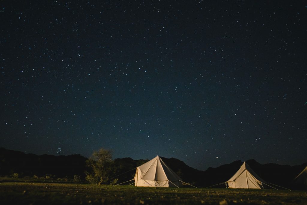 tent camping wedding under night sky in Arizona