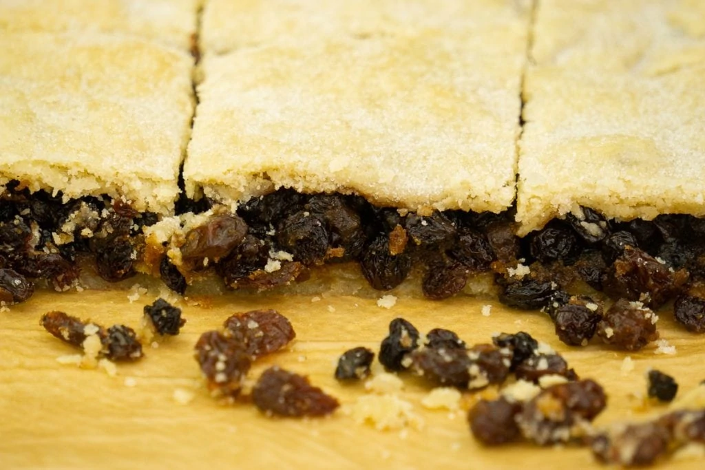 Flies' Graveyard Flies' Cemetery Scottish Fruit Square Scottish Fruit Slice Recipe on a plate