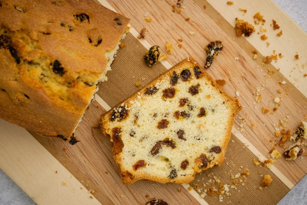 Sultana Loaf Recipe sliced on a chopping board