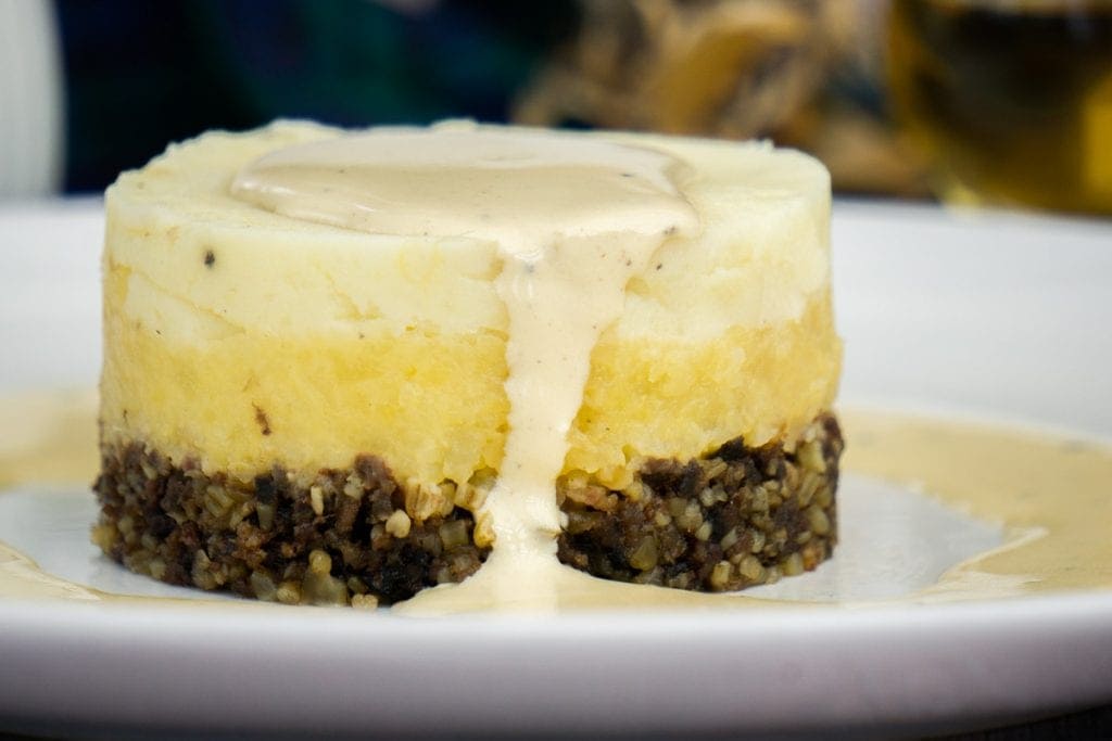 A haggis neeps and tatties stack, close up