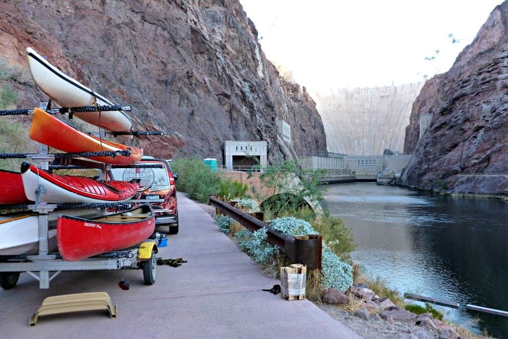 Kayaks stacked on a trailer are ready to be unloaded for Hoover Dam kayak tour