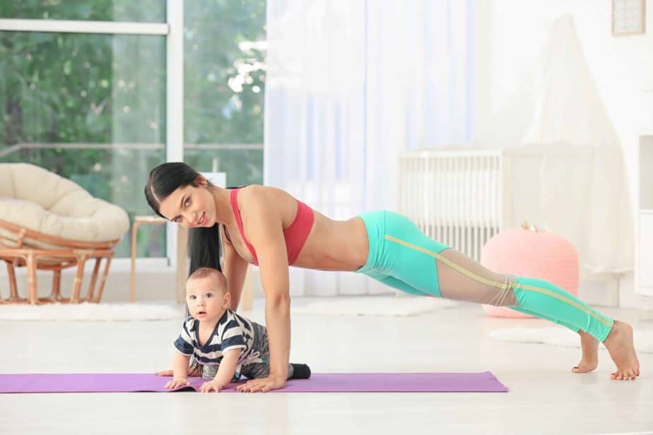 A mom has a training with her baby at home
