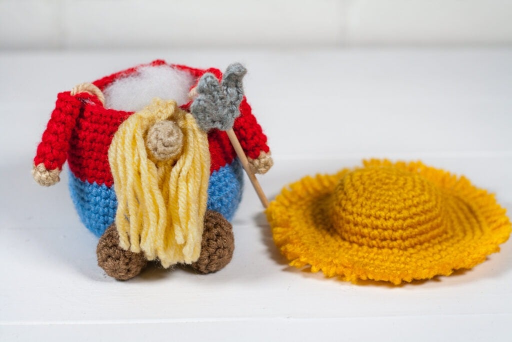 Crochet a farmer gnome with this free crochet pattern. This is one of many of my profession gnomes series. This gnome makes a perfect gift.
