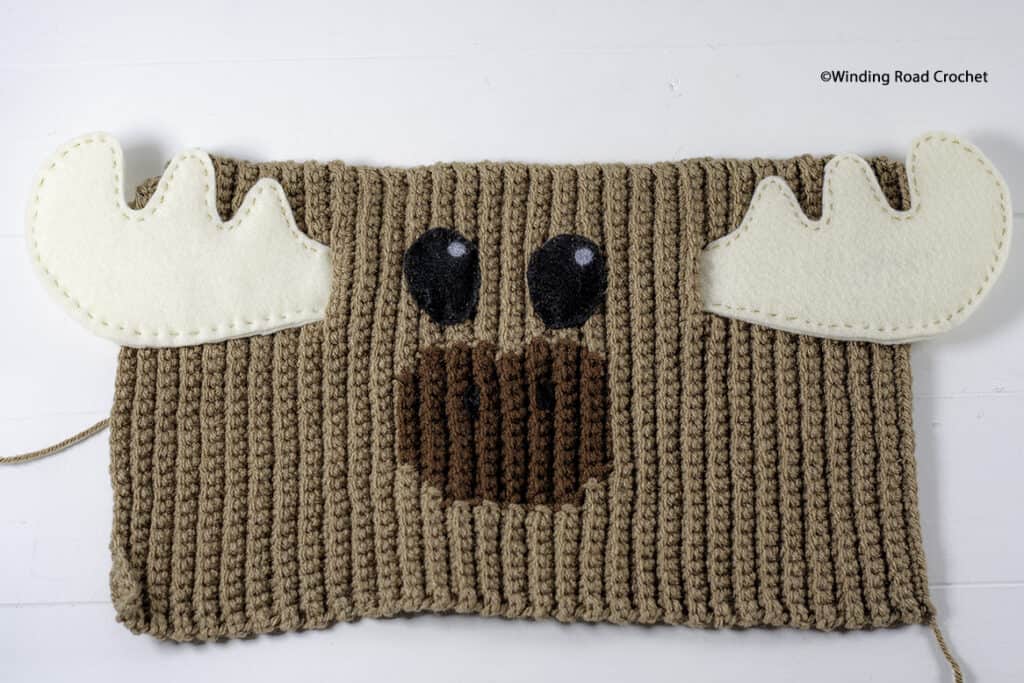 Free crochet pattern and printable template for this adorable crochet moose pumpkin. He will make a great addition to your fall decor.