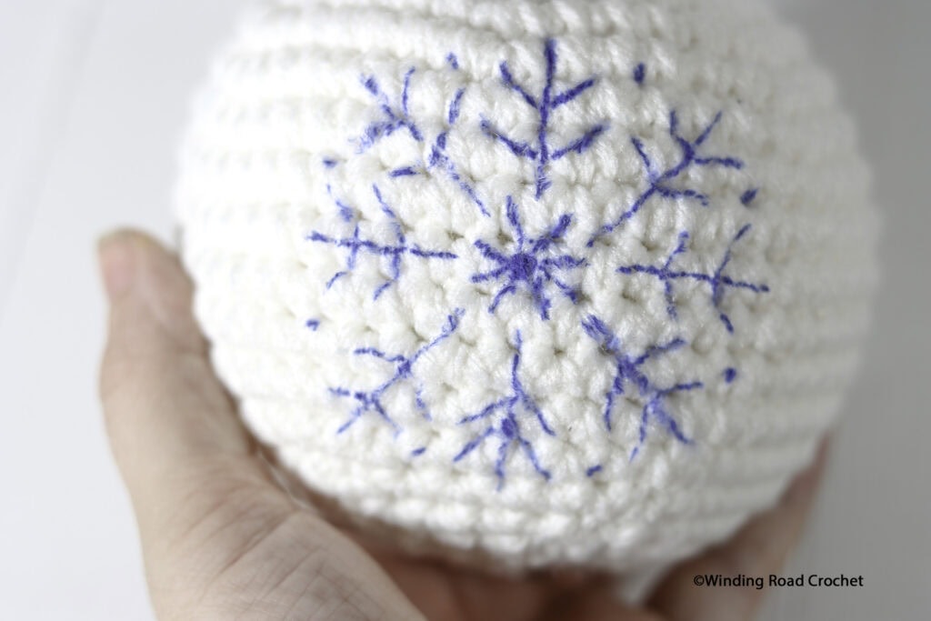 Crochet up some fun this winter with a crochet winter bowling set. Free crochet pattern with lots of different types of bowling pins.