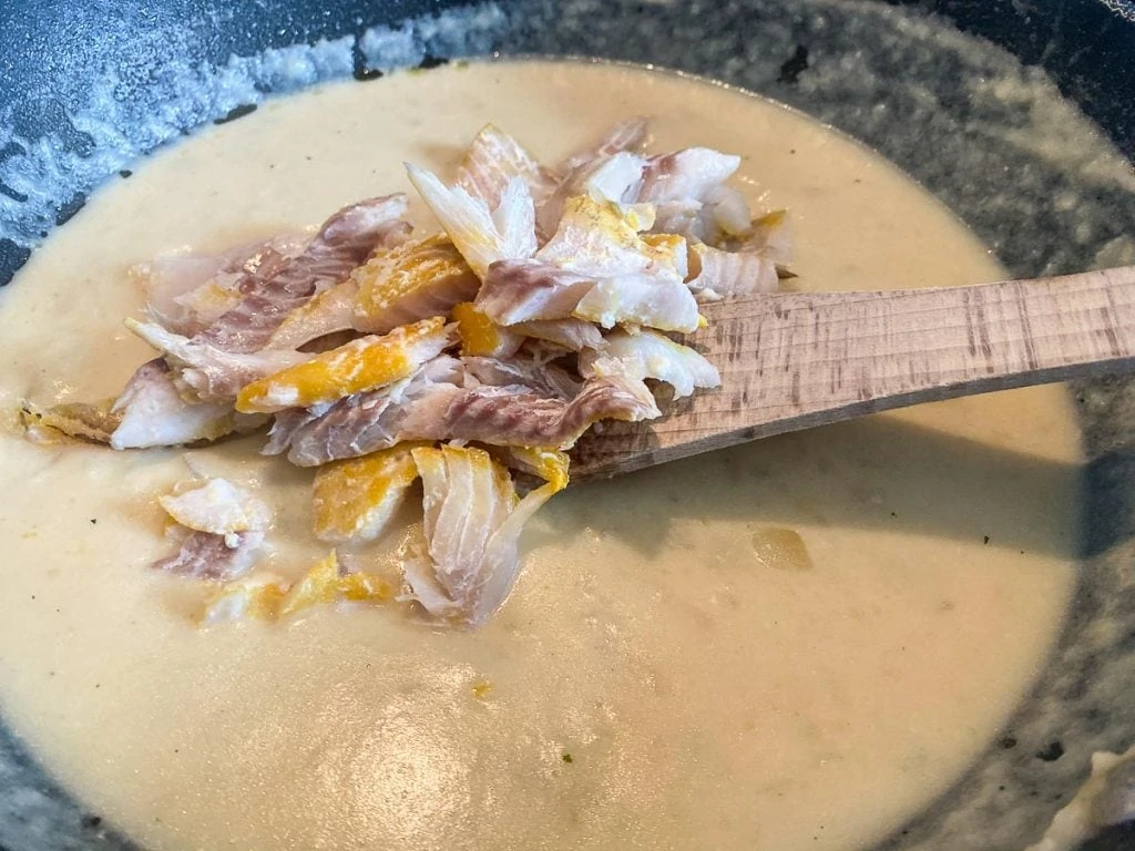 Putting Smoked Haddock into chowder for Cullen Skink Scottish Soup