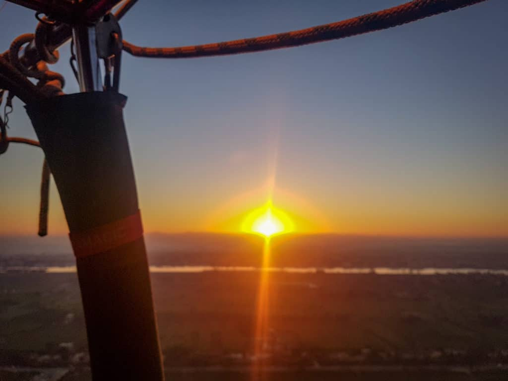 Watching sunrise over Luxor from hot air balloon