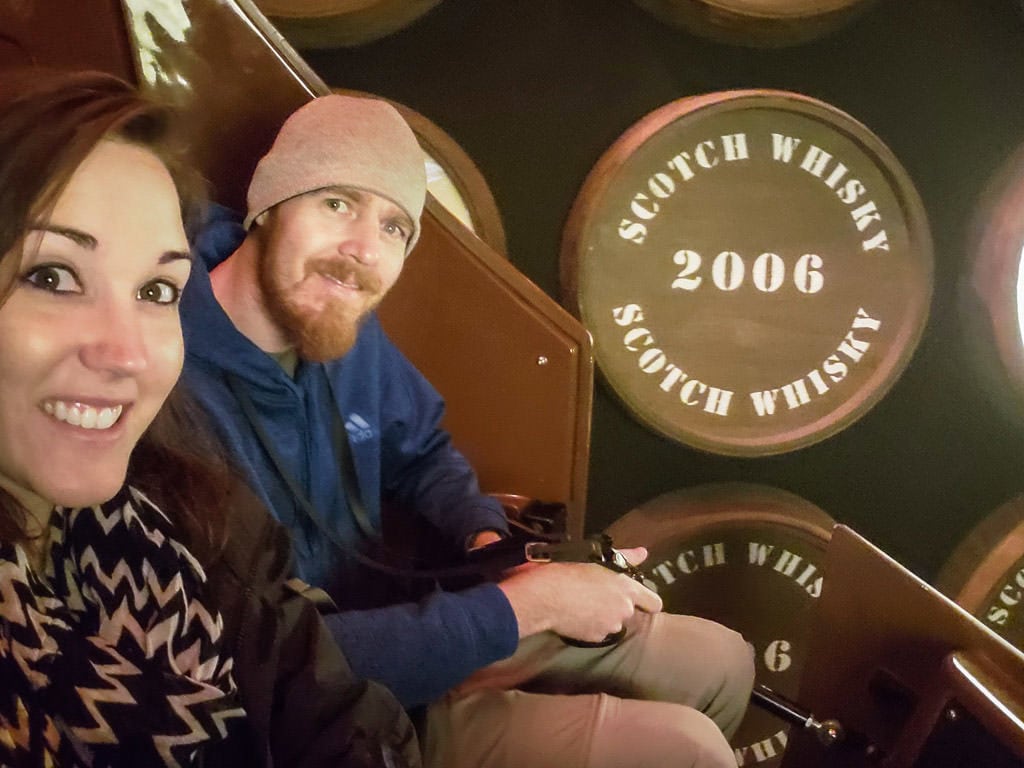 sitting in a barrel for scotch whisky experience in Edinburgh Scotland