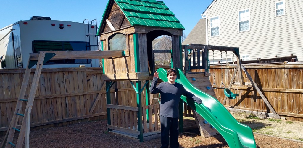 We have lived in this house since Elijah was 4, so it's all he remembers! Here is his final picture with his childhood play set. (He hasn't played on it for years! LOL)